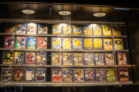 Tokyo, Japan, October 29, 2023: Display of valuable trading cards under lights in a collectible shopのeditorial素材