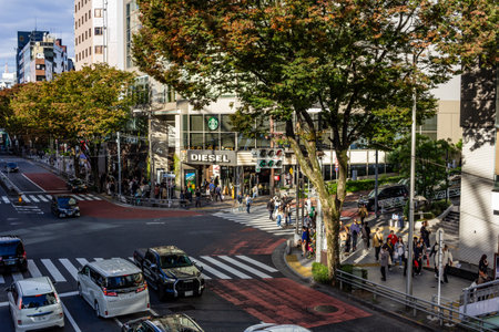 Tokyo, Japan, October 29, 2023: Busy street corner with DIESEL store and pedestrian trafficのeditorial素材