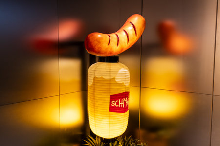 Tokyo, Japan, October 29, 2023: Illuminated sausage and beer lantern outside a restaurantのeditorial素材