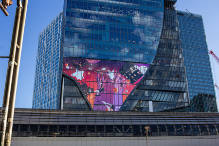 Tokyo, Japan, October 29, 2023: Modern building in Tokyo displaying a large LED screen advertisement