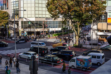 Tokyo, Japan, October 29, 2023: Street-level view of a crowded intersection near DIESEL store in Tokyoのeditorial素材