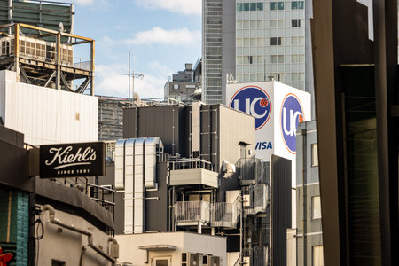 Tokyo, Japan, October 29, 2023: Architectural detail of urban buildings with commercial signageのeditorial素材