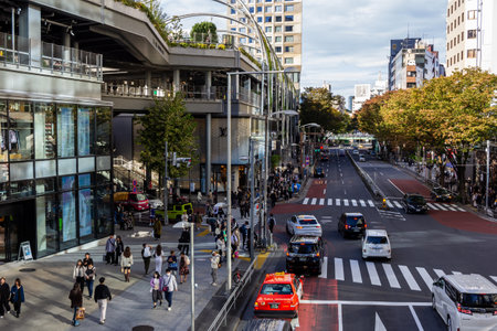 Tokyo, Japan, October 29, 2023: Urban street view with traffic and modern buildingsのeditorial素材