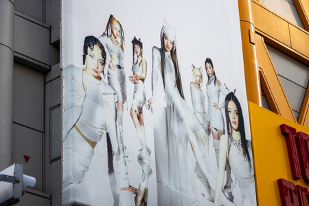 Tokyo, Japan, October 29, 2023: Large fashion advertisement mural on the side of a buildingのeditorial素材