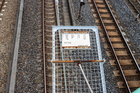 Tokyo, Japan, October 31, 2023: Railway tracks with a sign indicating a point of interest in Tokyoのeditorial素材