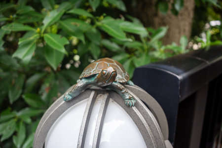 Tokyo, Japan, October 31, 2023: Decorative turtle sculpture on top of a lamppost