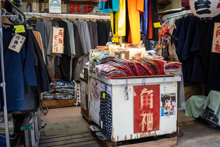 Tokyo, Japan, October 31, 2023: Traditional clothing and textiles for sale at a local market stallのeditorial素材