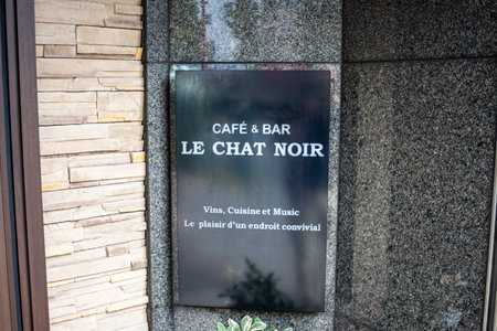 Tokyo, Japan, October 31, 2023: Entrance sign to CafÃ© & Bar Le Chat Noir with French textのeditorial素材