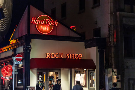 Tokyo, Japan, October 31, 2023: Entrance of Hard Rock Cafe at nightのeditorial素材