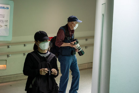 Tokyo, Japan, October 31, 2023: Photographers in a public space