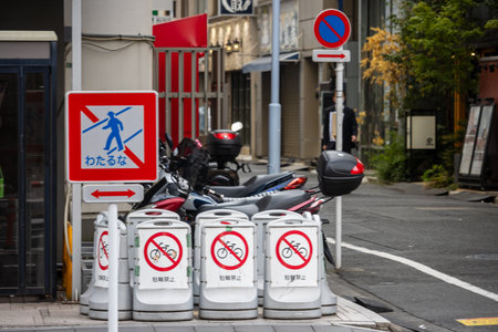 Tokyo, Japan, October 31, 2023: Prohibited parking sign near motorcycles and gas cylindersのeditorial素材