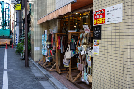 Tokyo, Japan, November 1, 2023: Sidewalk sale outside a local fashion boutique in Tokyoのeditorial素材