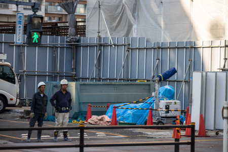 Tokyo, Japan, November 1, 2023: Construction workers at a building site in Tokyoのeditorial素材