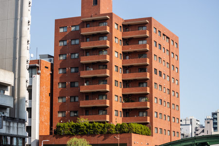 Tokyo, Japan, November 1, 2023: Residential apartment building in Tokyo's urban landscapeのeditorial素材