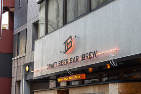 Tokyo, Japan, November 1, 2023: Craft Beer Bar iBrew Signage on Building Exterior
