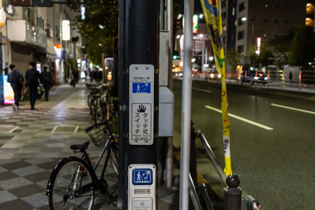 Tokyo, Japan, November 1, 2023: Evening Street View with Bicycles and Signage in Tokyoのeditorial素材
