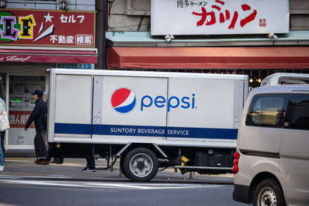 Tokyo, Japan, November 1, 2023: Pepsi delivery truck on a busy street in Tokyoのeditorial素材