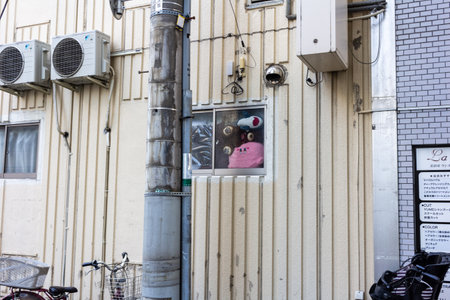Tokyo, Japan, November 1, 2023: Urban scene with multiple air conditioning units on a building's exteriorのeditorial素材