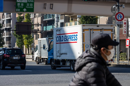 Tokyo, Japan, November 1, 2023: Cold Express refrigerated delivery truck on city streetのeditorial素材