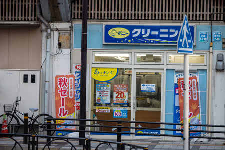 Tokyo, Japan, November 1, 2023: Front View of a Japanese Coin Laundry Shopのeditorial素材