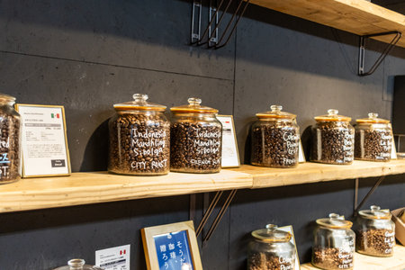 Tokyo, Japan, November 1, 2023: Variety of Coffee Beans Displayed in Glass Jars in a Specialty Coffee Shopのeditorial素材