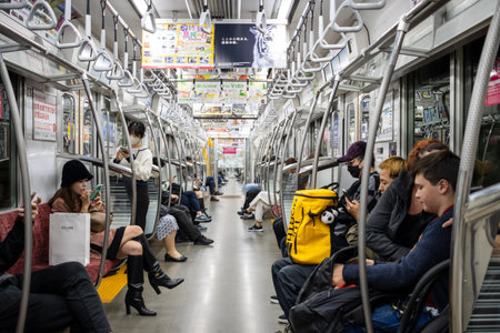 Tokyo, Japan, November 1, 2023: Passengers on a Tokyo Metro Trainのeditorial素材