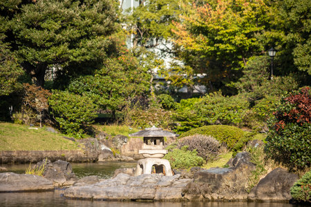 Tokyo, Japan, November 1, 2023: Lantern and Trees in Hama Rikyu Gardensのeditorial素材