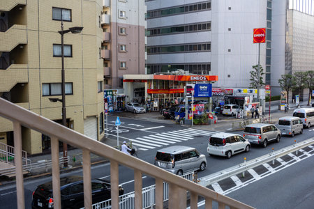 Tokyo, Japan, November 1, 2023: View of a Busy Intersection and ENEOS Gas Station in Tokyoのeditorial素材