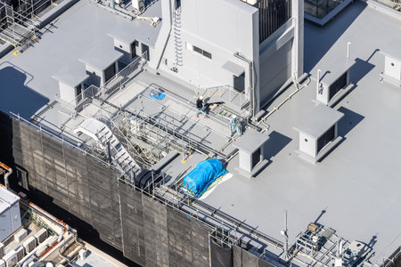 Tokyo, Japan, November 2, 2023: Aerial view of Tokyo building rooftop with various mechanical unitsのeditorial素材