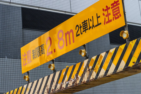Tokyo, Japan, November 2, 2023: Warning sign for height restriction in a parking areaのeditorial素材
