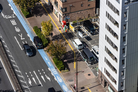Tokyo, Japan, November 2, 2023: Aerial view of city traffic and parking area in Tokyo