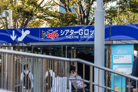 Tokyo, Japan, November 2, 2023: Pedestrians walking by Theater G-Rosso in Tokyo's entertainment districtのeditorial素材