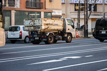 Tokyo, Japan, November 2, 2023: Construction truck and vehicles on the road