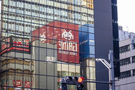 Tokyo, Japan, November 2, 2023: Uniqlo Billboard on a Building in a Busy Commercial Area