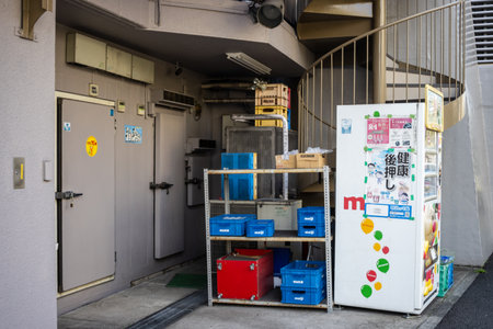 Tokyo, Japan, November 2, 2023: Vending Machine Corner by Residential Entranceのeditorial素材
