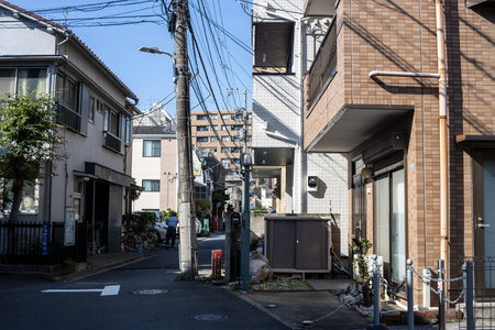 Tokyo, Japan, November 2, 2023: Traditional residential area with houses and alleyのeditorial素材