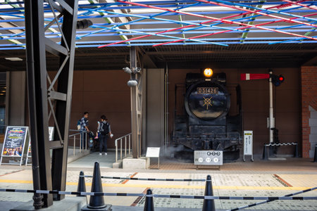 Tokyo, Japan, November 3, 2023: Restored vintage steam locomotive at railway museumのeditorial素材