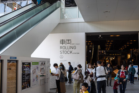 Tokyo, Japan, November 3, 2023: Commuters exiting a Rolling Stock Exhibitionのeditorial素材
