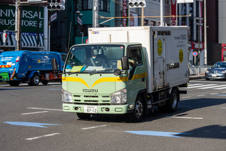Tokyo, Japan, November 3, 2023: Isuzu Delivery Truck on the Streetのeditorial素材