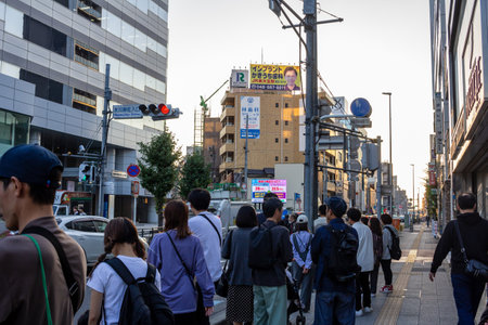 Tokyo, Japan, November 3, 2023: Pedestrians walking in the bustling streets of Tokyoのeditorial素材