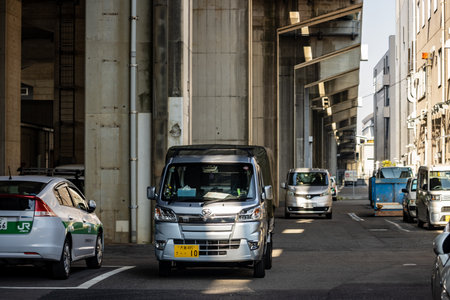 Tokyo, Japan, November 3, 2023: Urban Scene with Cars and Pedestrians in Shibuyaのeditorial素材