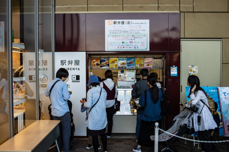 Tokyo, Japan, November 3, 2023: Customers waiting in line at a local bakery shopのeditorial素材