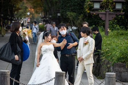 Tokyo, Japan, November 3, 2023: Wedding photoshoot in progress at Ueno Parkのeditorial素材