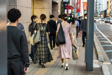 Tokyo, Japan, November 3, 2023: Pedestrians Walking in Fashionable Attire in Ginza Districtのeditorial素材