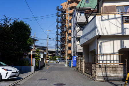 Tokyo, Japan, November 3, 2023: Quiet residential street with modern apartmentsのeditorial素材