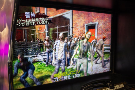Tokyo, Japan, November 3, 2023: Gaming Event Promotion on Large Screen in Urban Areaのeditorial素材