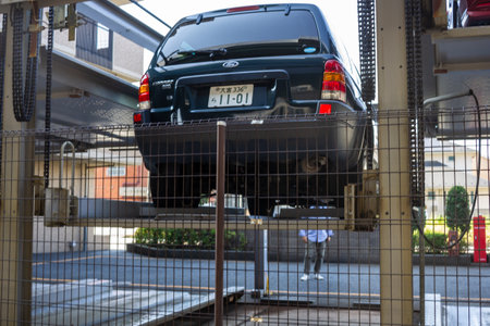Tokyo, Japan, November 3, 2023: Car parked in an elevated mechanical parking systemのeditorial素材