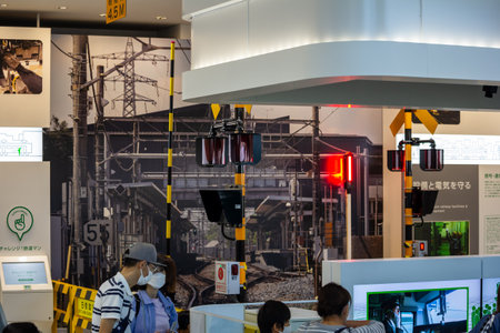 Tokyo, Japan, November 3, 2023: Visitors at the Railway Museum Observing Train Exhibitsのeditorial素材