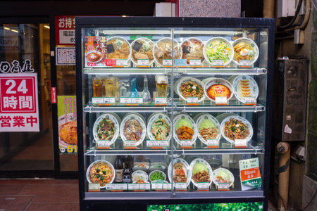 Tokyo, Japan, November 3, 2023: Display of Various Ready Meals in a Vending Machineのeditorial素材
