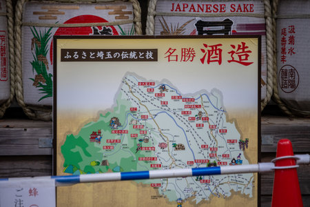 Tokyo, Japan, November 3, 2023: Japanese sake map and traditional barrels on displayのeditorial素材